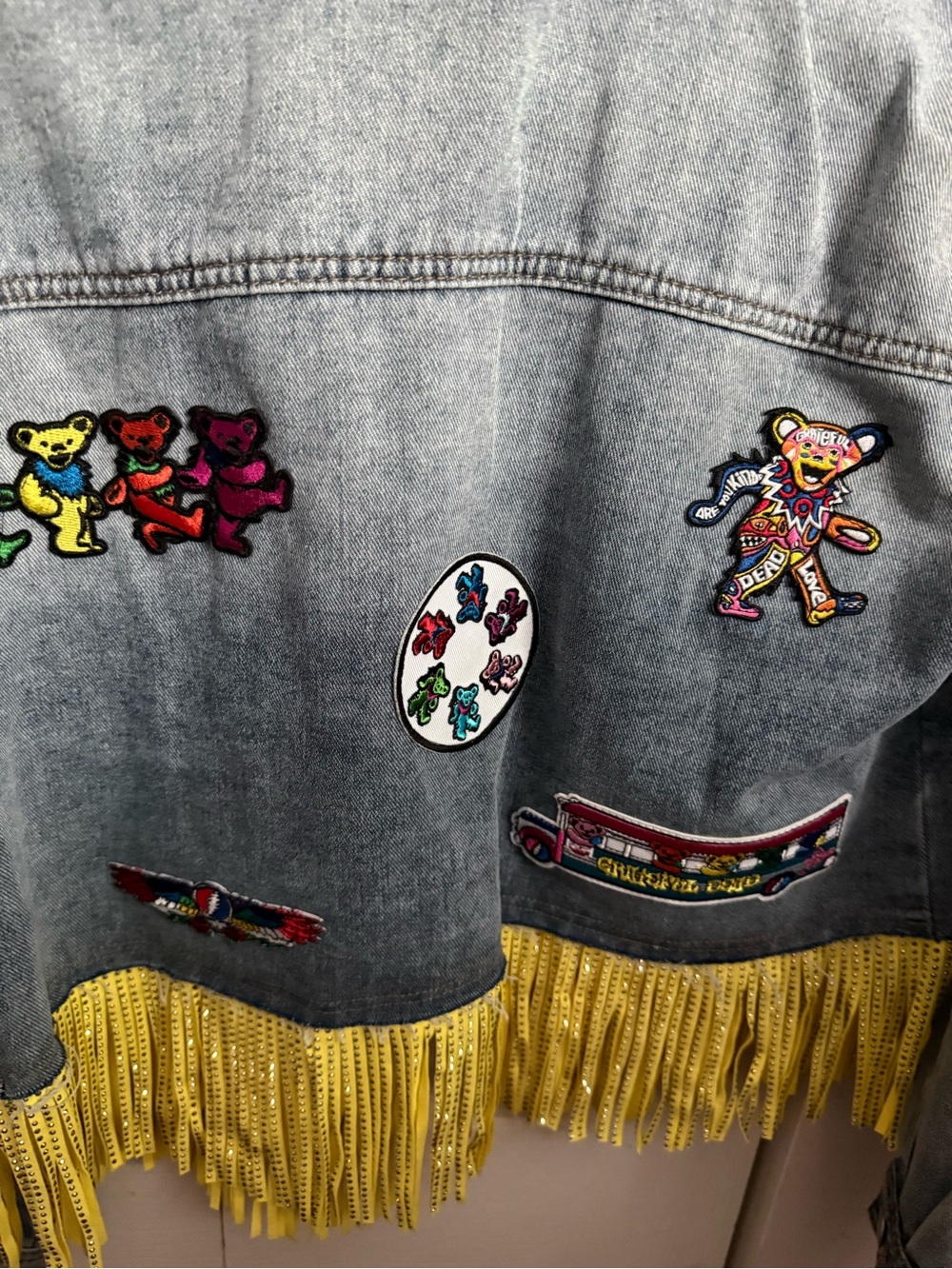 Women Light Wash Denim Jacket with Yellow Fringe and Colorful Patches